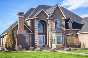 Modern two story house with multiple roofs