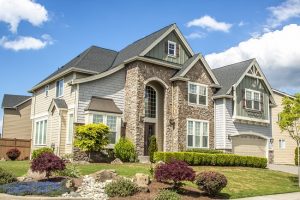 Beautiful modern suburban home with large multiple roofs